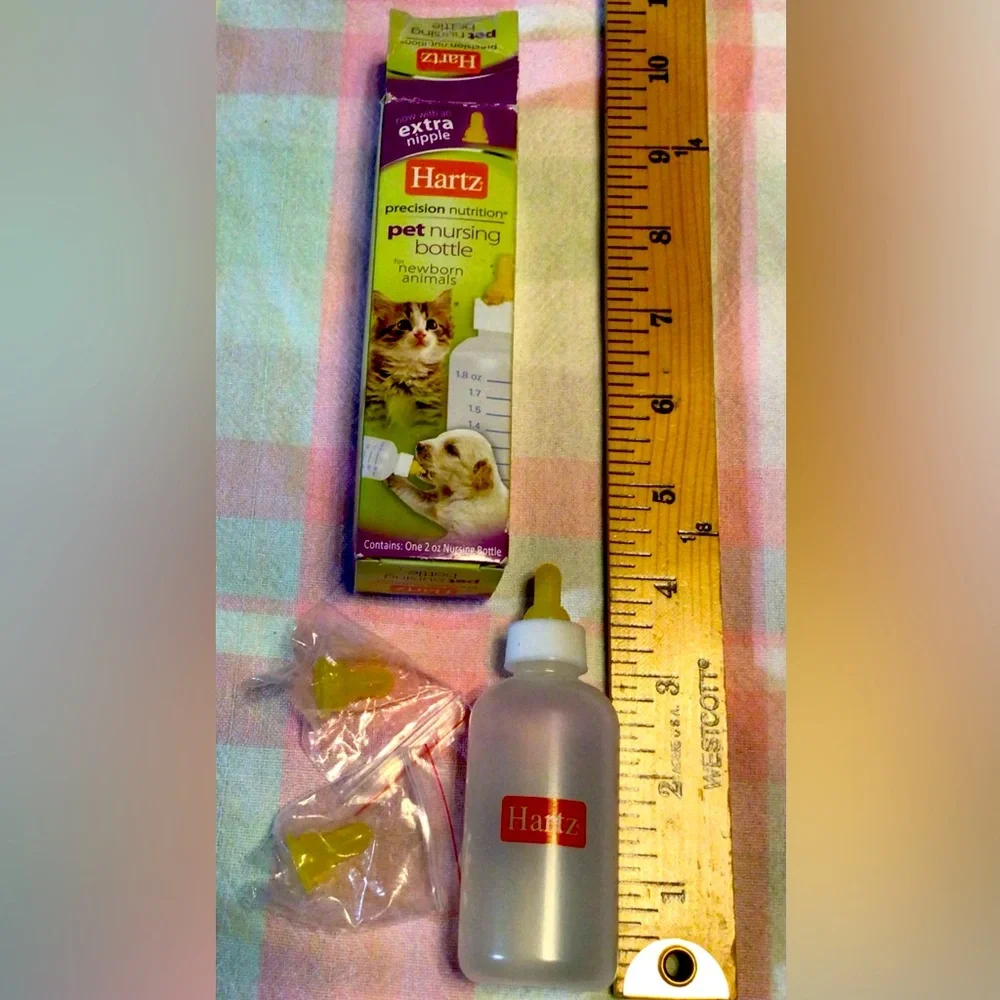 Hartz pet nursing bottle with two extra nipples. New in box.